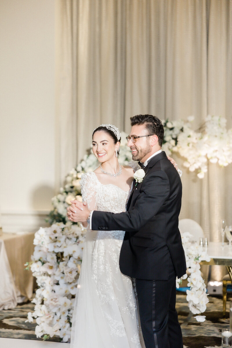 Bride and groom at their wedding reception at the four seasons Orlando by Florida wedding photographer.