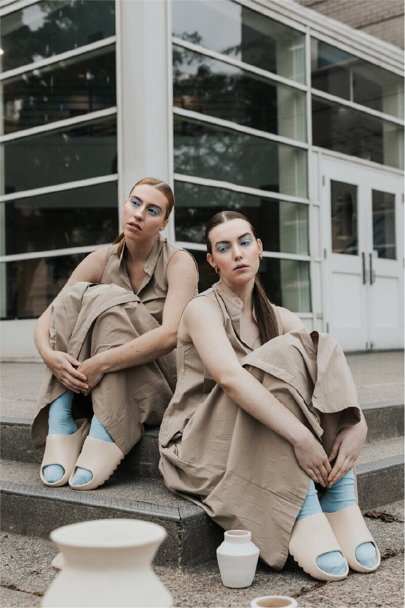 ceramics product shot with two women in matching outfits