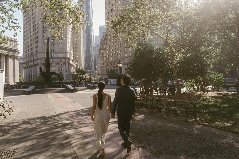 bride and groom walking outside after eloping shot by Elsie Goodman Photography | NYC Elopement Packages