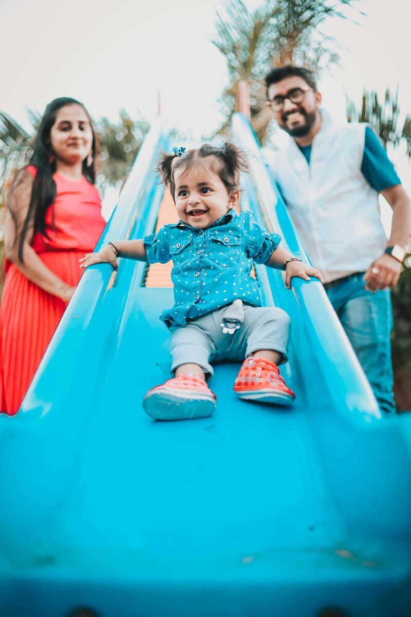 family playing at park