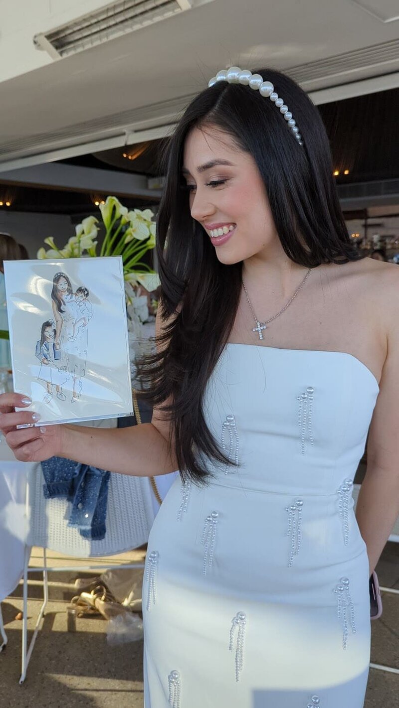 guest-posing-with-hand-made-wedding-favour