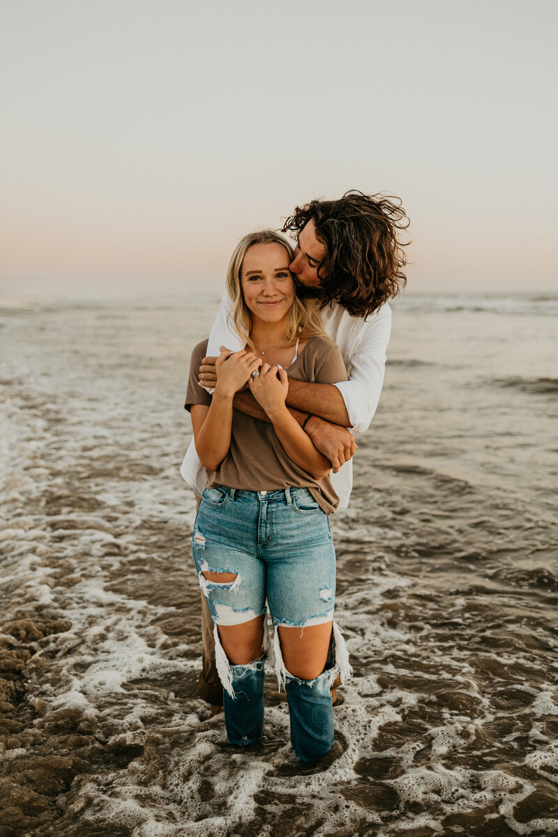 Molly with her husband at the beach