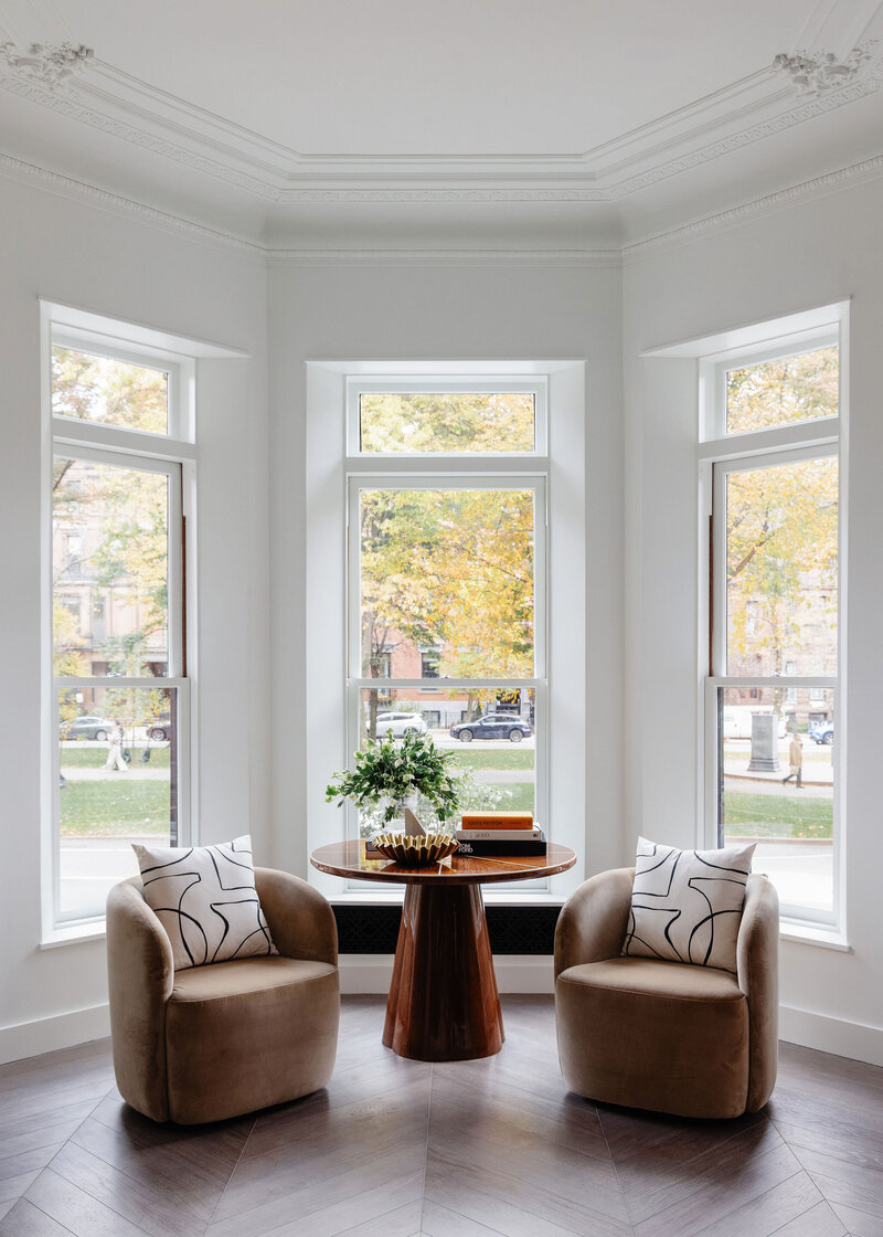 Hand-cast plaster molding and corner cartouches