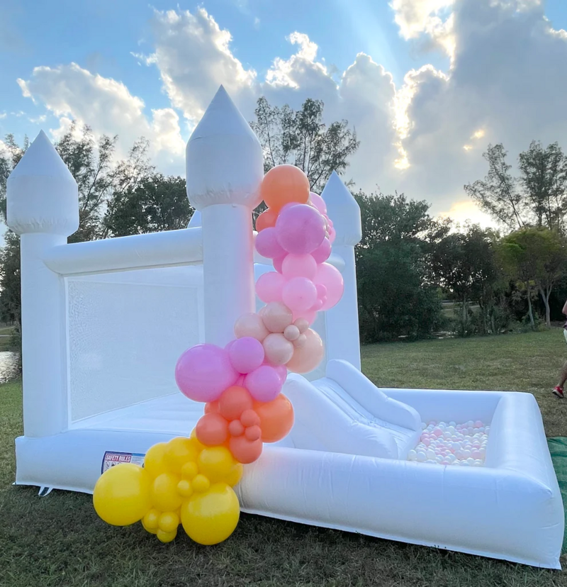 THE MINI WHITE INFLATABLE BOUNCE HOUSE WITH BALLOON GARLAND - ISLAND INFLATABLES WA