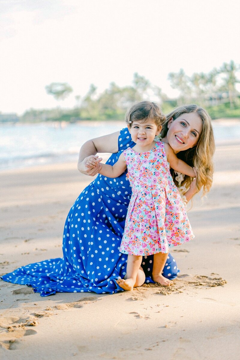 Mommy and little girl at Ulua beach for family photos