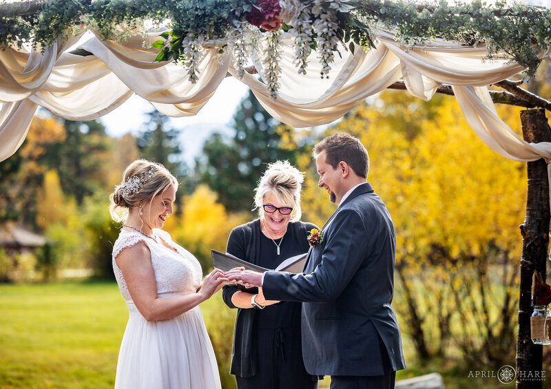 Pretty Fall Wedding Ceremony at Romantic Riversong Inn in Estes Park CO
