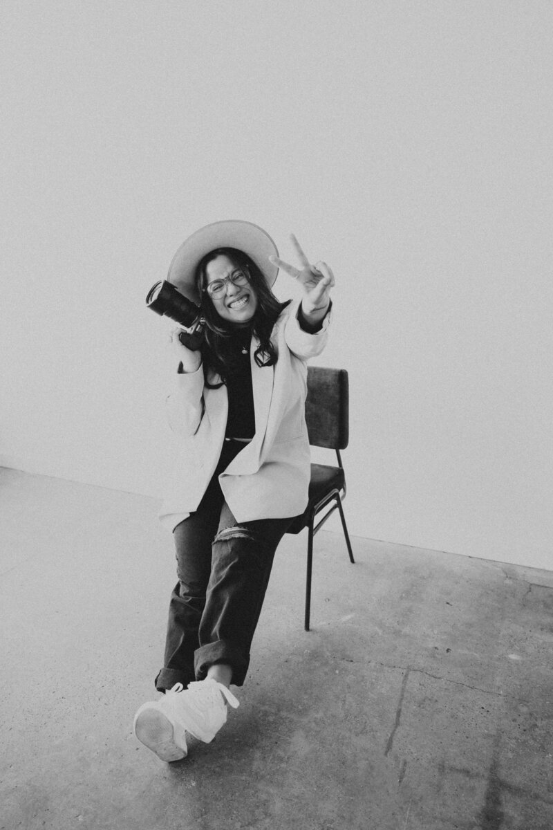 woman sitting on stool