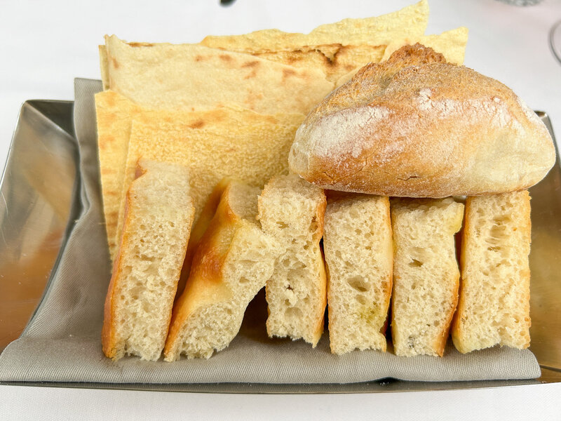Focaccia bread served at a starter at Paper Moon Giardino in Milan, Italy