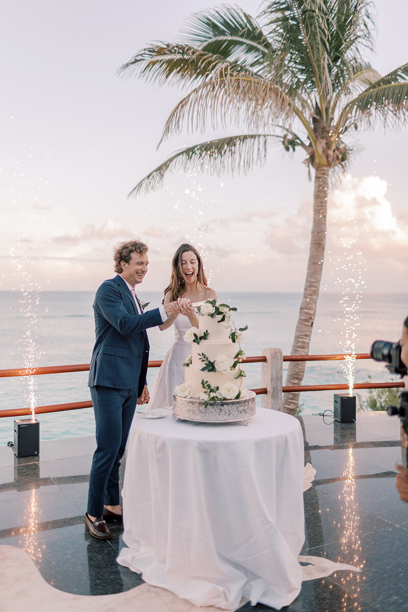 Bermuda Wedding Bermuda Bride Groom and Bride Cutting Cake with Ocean View