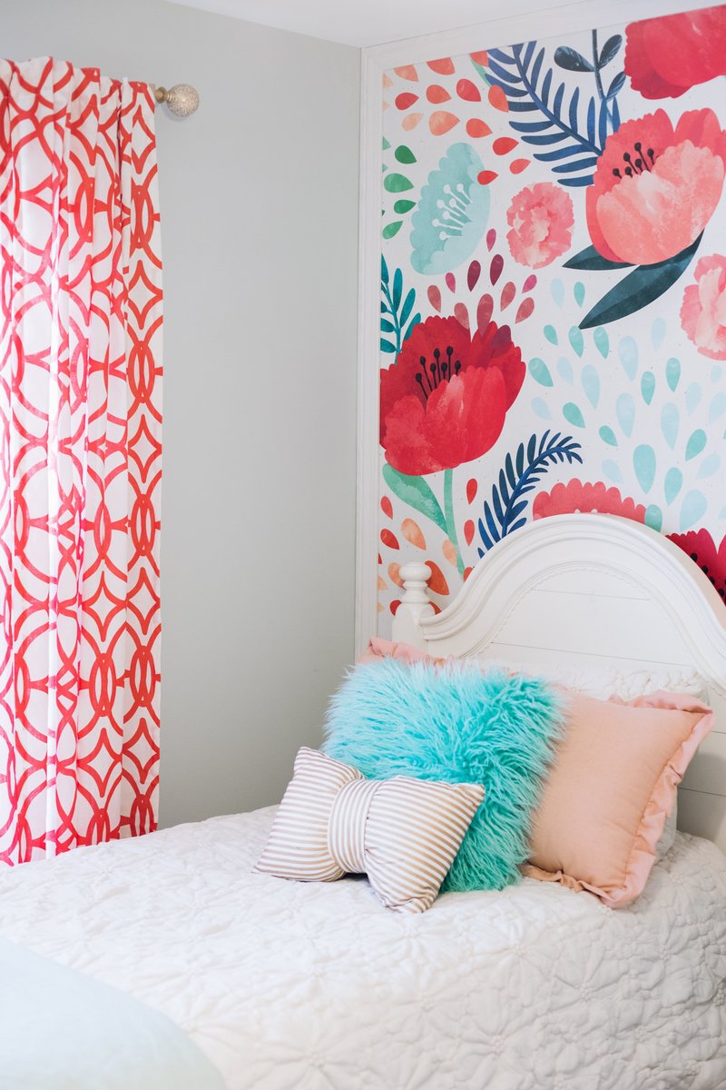 kid's bedroom with a bright pink and blue color palette