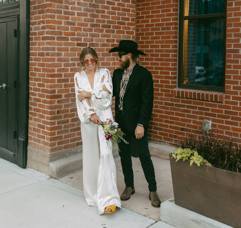 Couple dressed up laughing