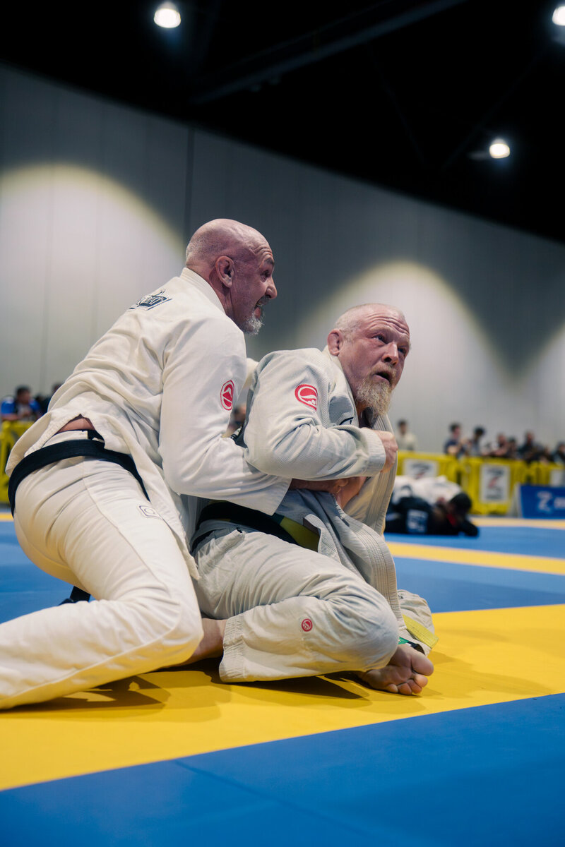 Tournament photography of two masters black belts