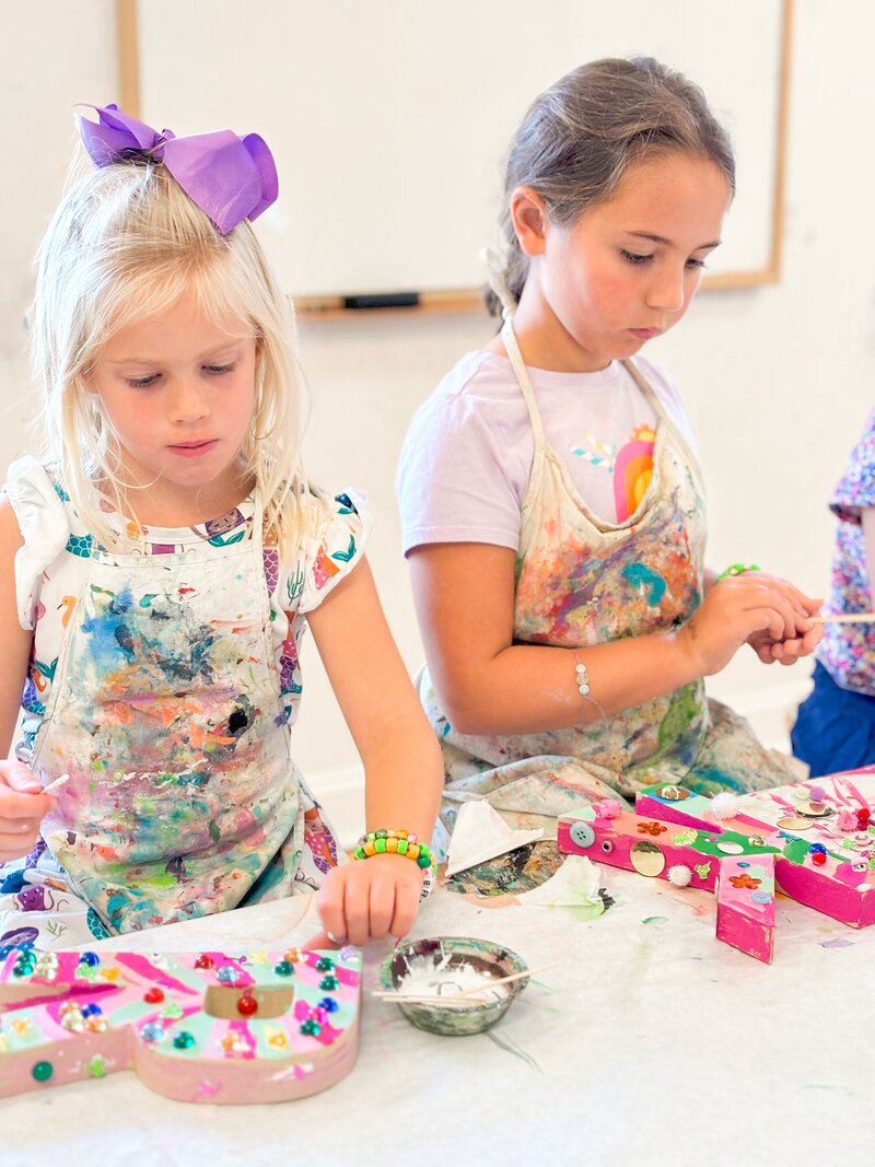 Two Young girls crafting