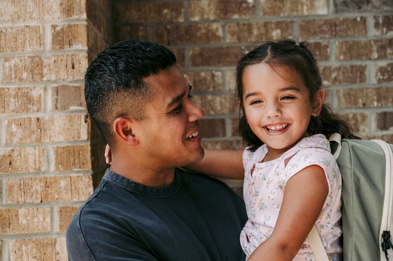 Child and dad getting ready for therapy in Marana Arizona