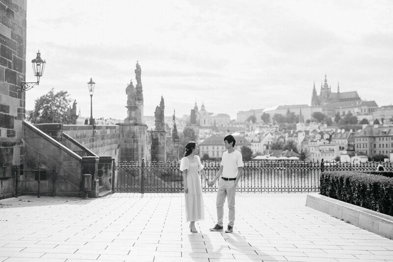 Engaged couple in prague in from of Prague castel