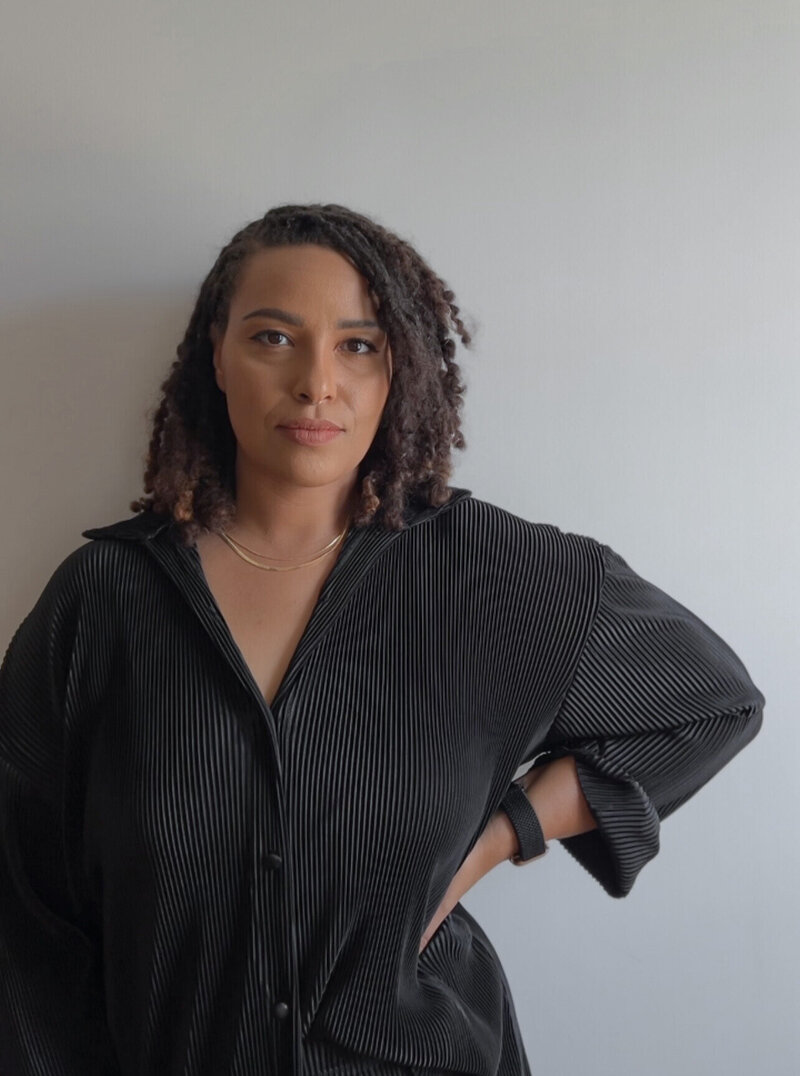 Image of a therapist and coach for moms of color in Matrescence and early Motherhood