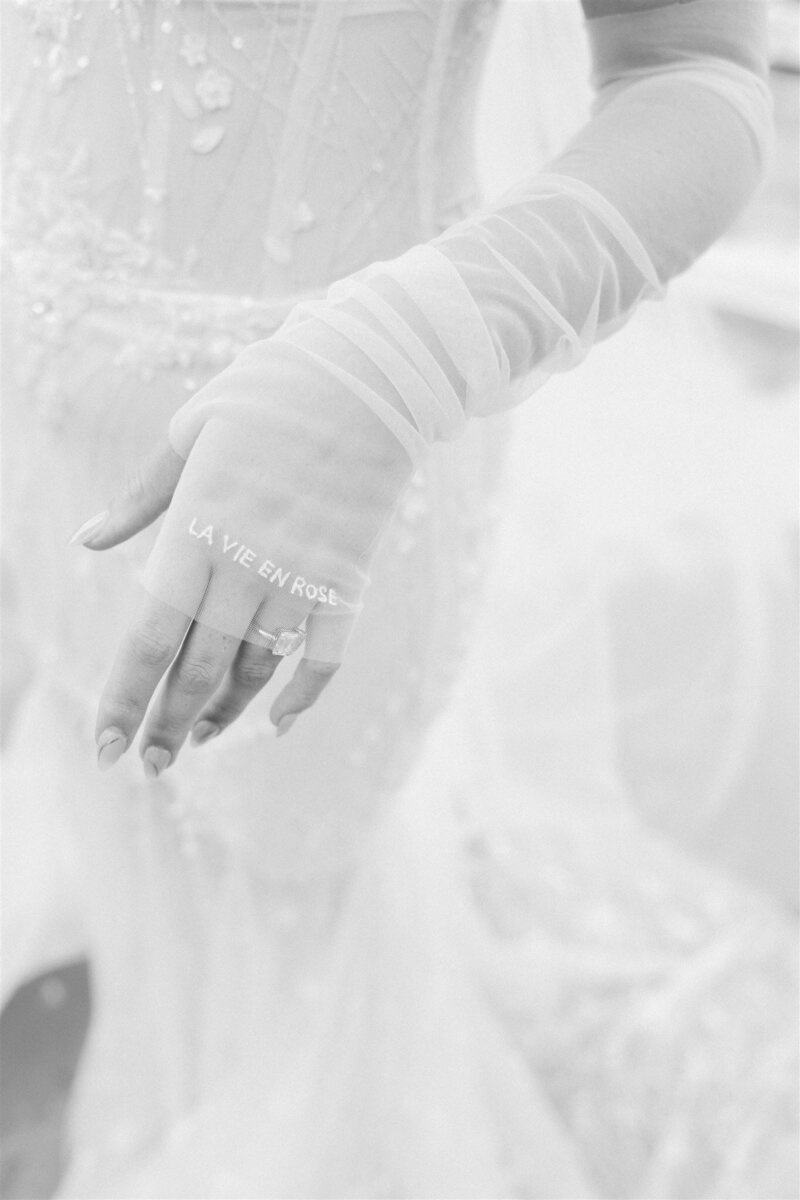 Bride detail shot at Marie Selby Botanical Gardens in Sarasota, Florida—capturing delicate wedding accessories and timeless elegance in a lush botanical setting, styled by Watters & Co. Events.