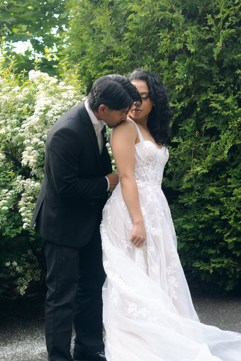 A timeless black-and-white portrait of a newlywed couple in Montreal, capturing raw emotions and elegant details with a film-inspired touch.