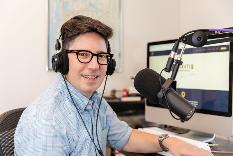 financial advisor recording a podcast from home office Laure Photography