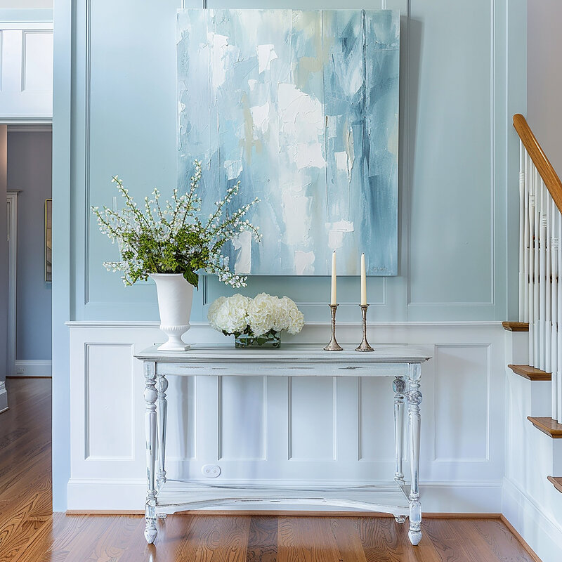 Elegant console table with vase and white florals — representing thoughtful growth, storytelling, and blog coaching credibility