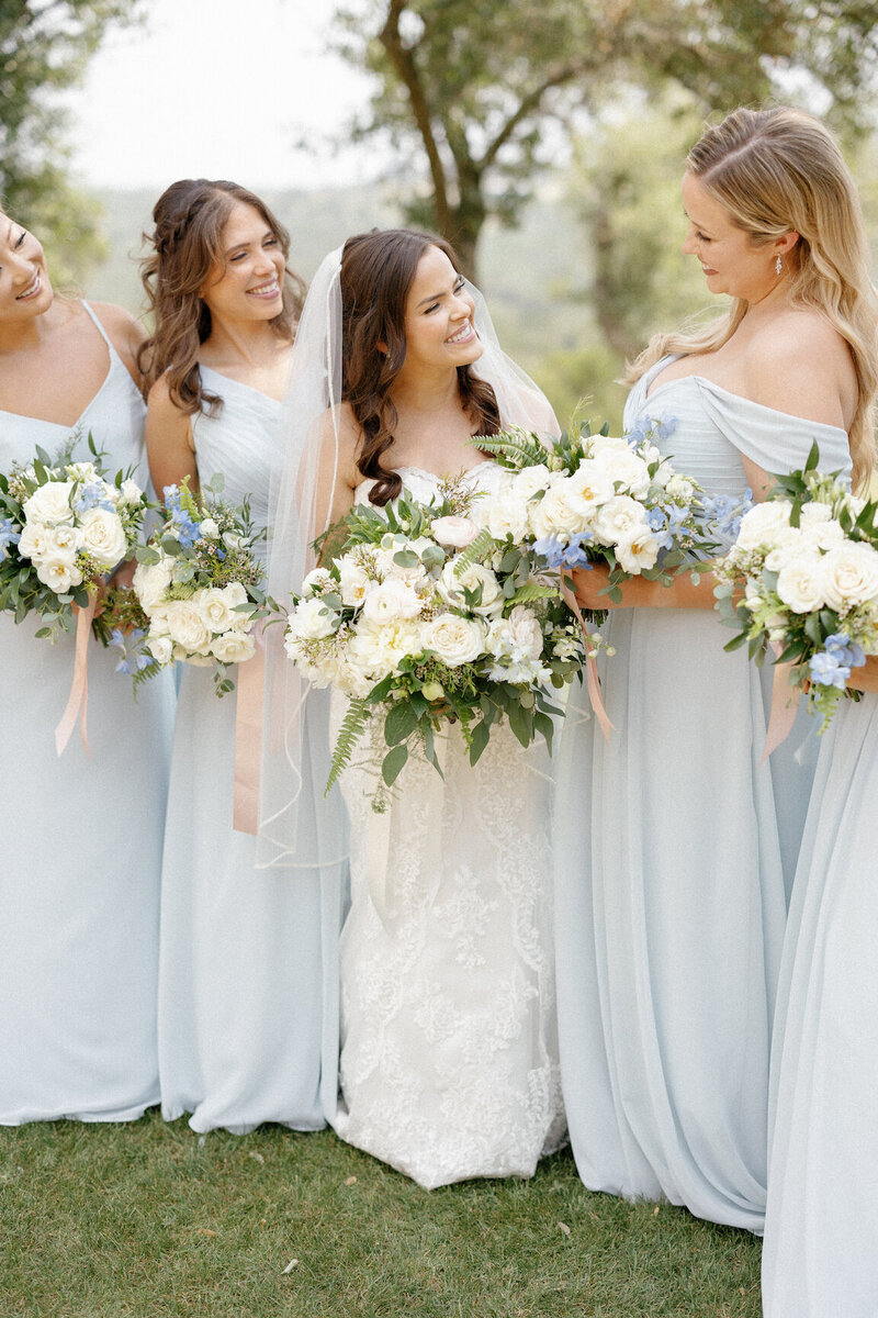 Wedding party photos beneath oak trees at Canyonwood Ridge