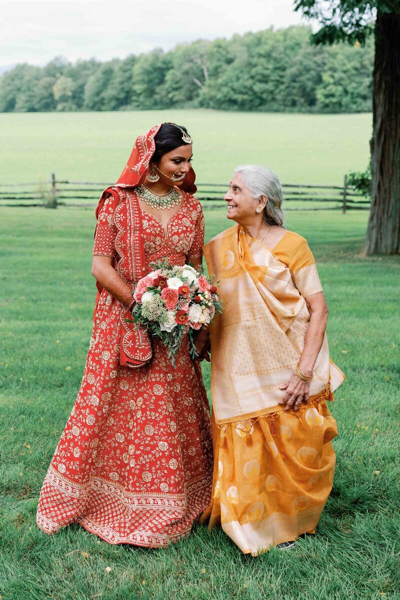 bride looks at grandmother at indian wedding brick house shelburne museum