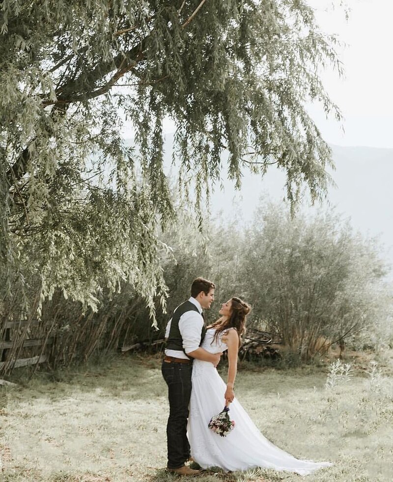 Wedding_photography_under_willow_tree_bride_groom__A_summer_rustic_ranch_wedding_copy-4f9b07b5