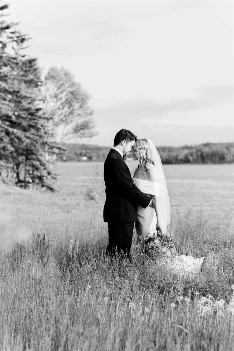 Nova Scotia Bride and Groom at MIra Boat Club on wedding day photo taken by CDM Photography one of Cape Breton's Wedding Photographers
