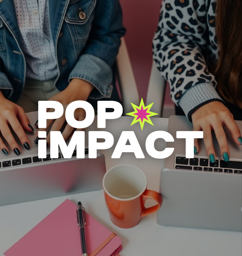 Micaela spinning and laughing in front of a colorful wall at Union Cowork in Encinitas, California