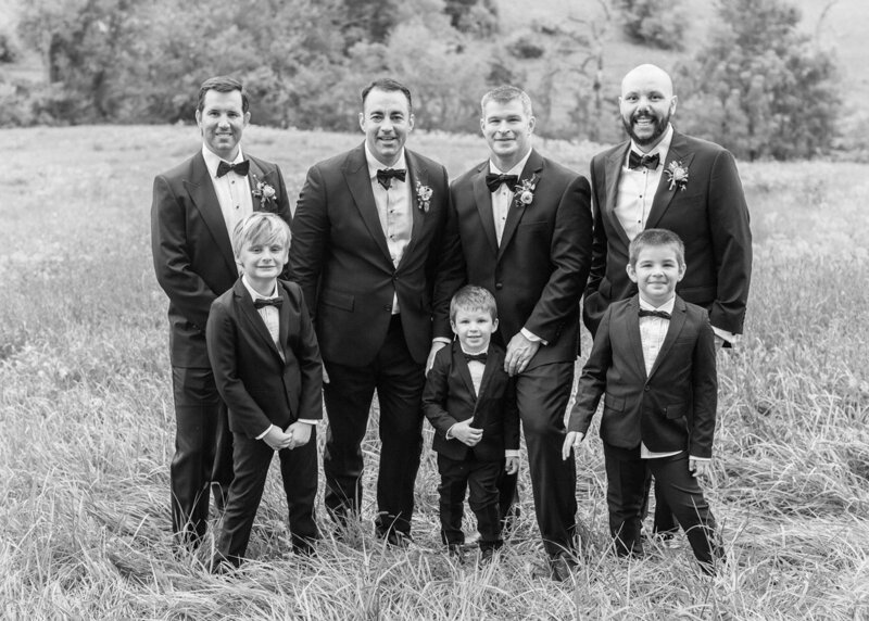 Group of groomsmen in tuxedos during luxury estate wedding in Virginia, photographed by Washington DC Wedding Photographer.