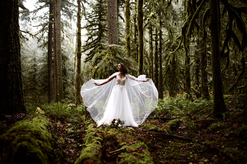 bride dancing in the forrest on her wedding day Oregon Coast elopement and wedding photographer