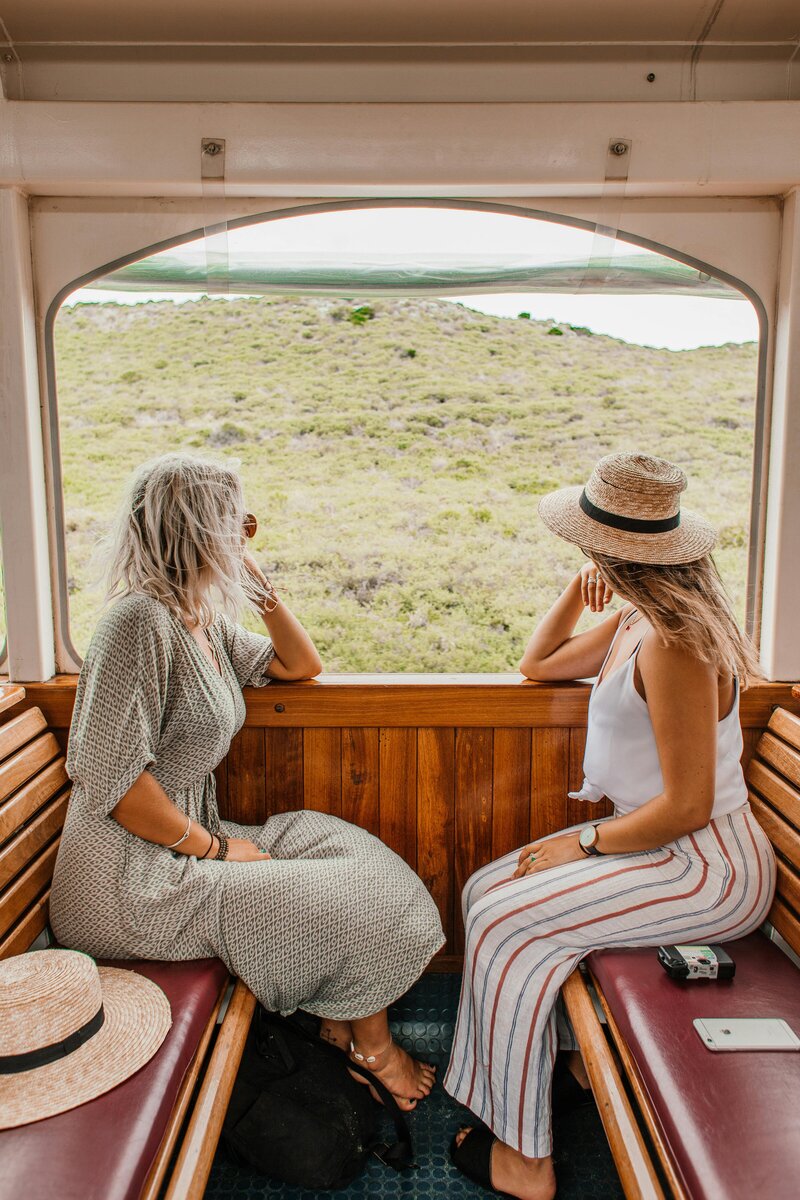 Women looking out window