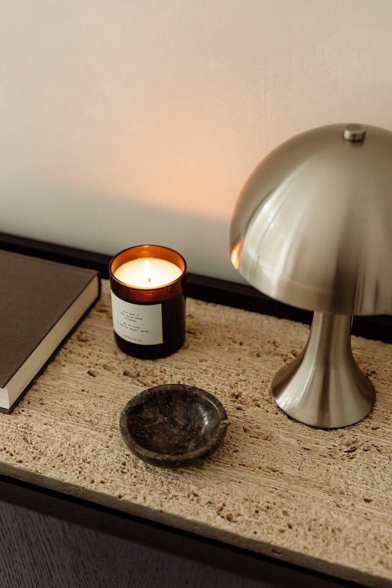 kaboompics_uncommon-black-console-with-travertine-and-wood-veneer-decor-37078