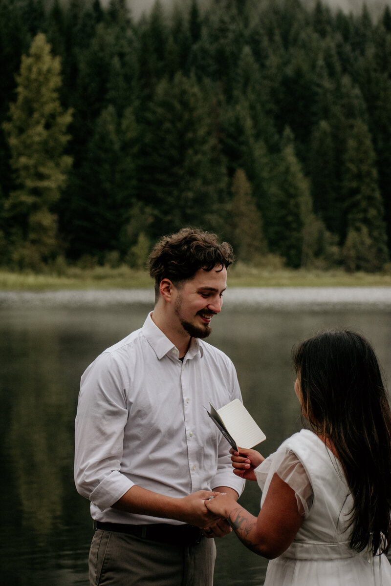 A couple standing in the PNW forest of Mt. Hood National Park.