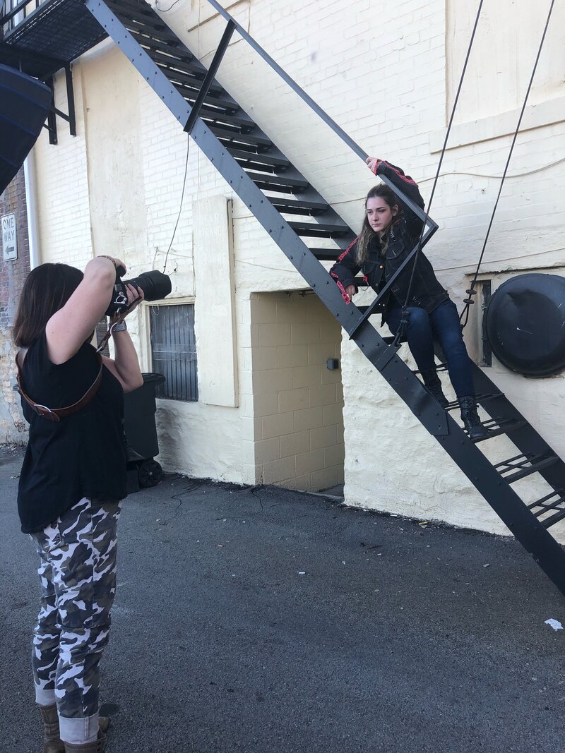 Photo shoot of senior girl on fire escape