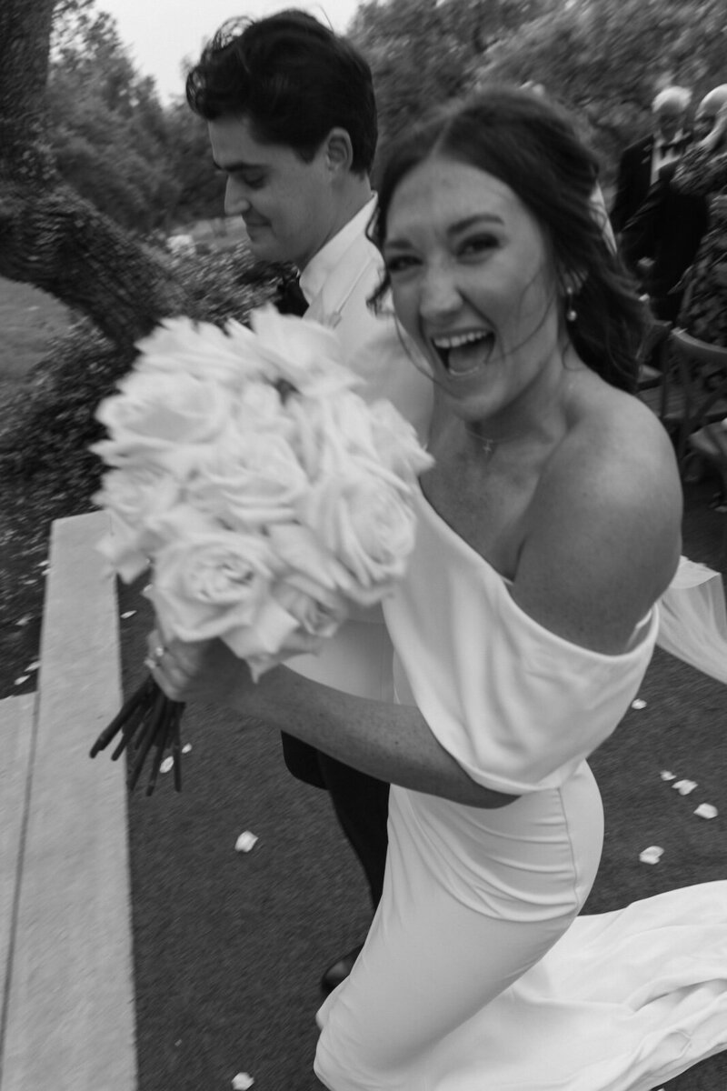 bride and groom exit wedding ceremony