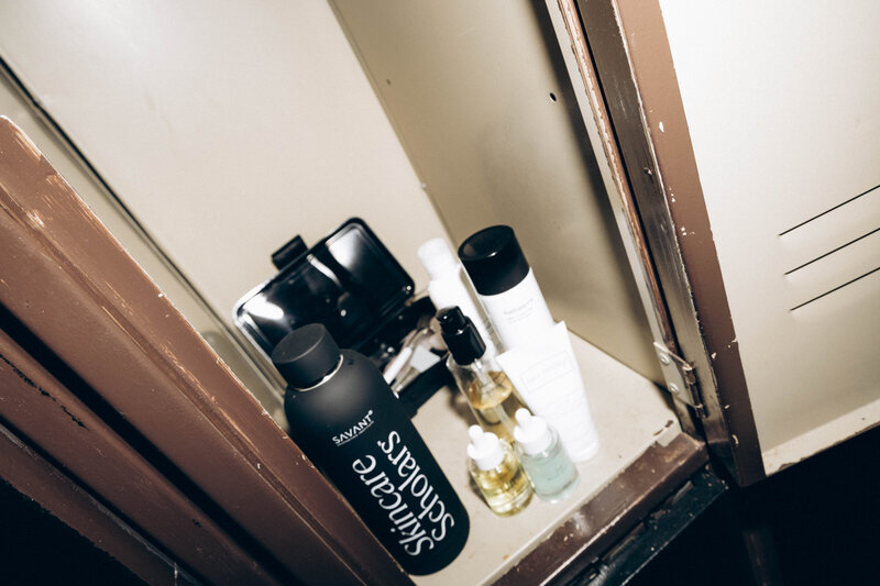 A neatly organized locker brimming with premium skincare products, each meticulously arranged to showcase the tools of the trade for future beauty professionals.