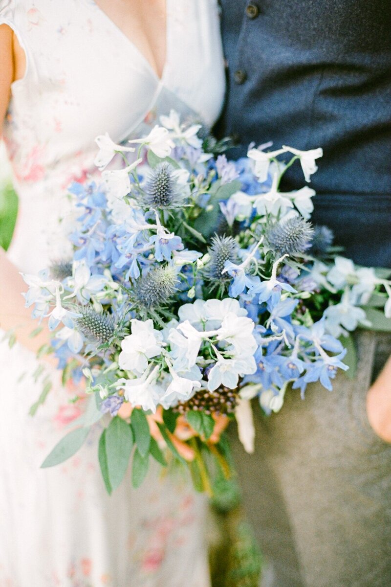 blue wedding bouquet made with thistle