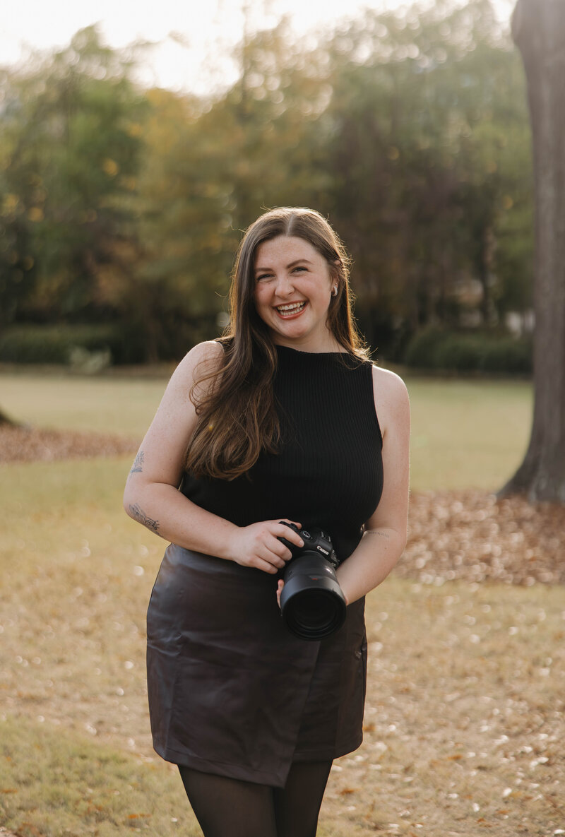 Reagan, an Alabama wedding photographer posed at the University of Alabama