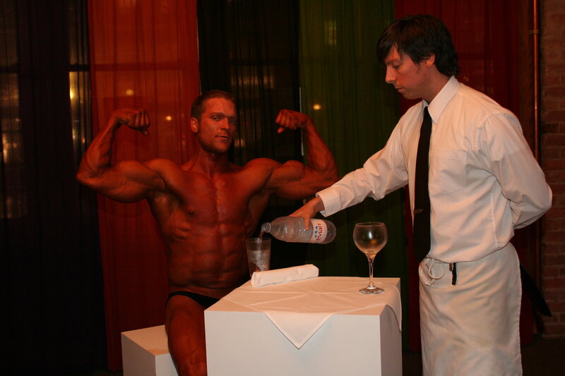 Brent Ray Fraser Posing on Stage The Transitional Culture being Served Wine By Professional Waiter As Art 2005