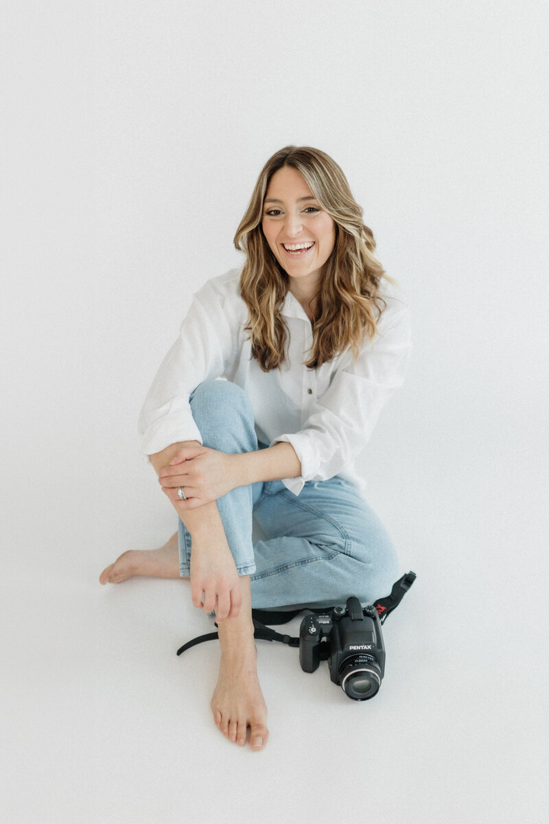 Photo of Kayla Mari Photography in studio.