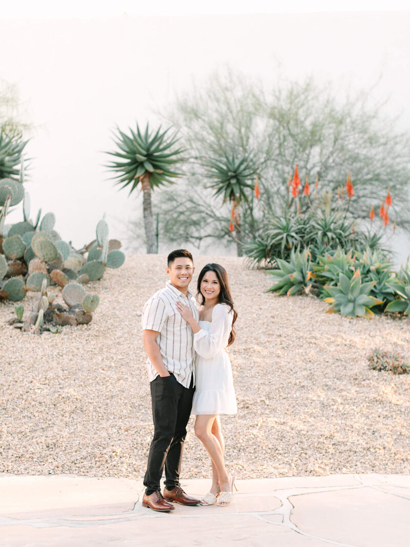 noguchi garden engagement photo of couple in front of cactus garden