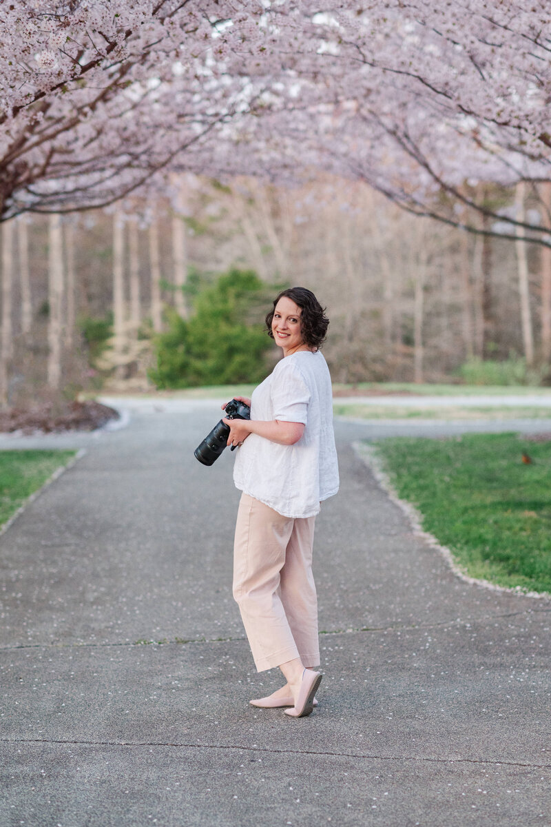Winston-Salem photographer Emily Richardson holding her child