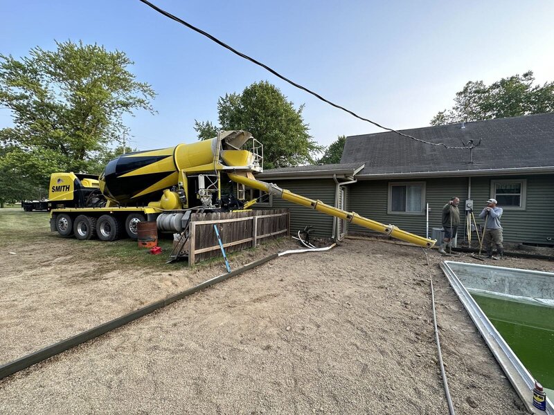 Pool deck pour: conveyor truck placing concrete for a new pool deck in Goshen, IN
