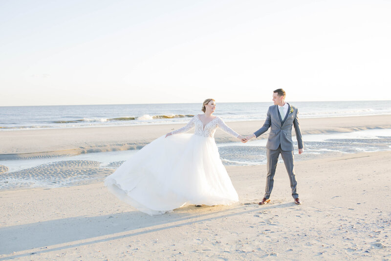 Bride and groom dancing on the beach, Isle of Palms wedding day