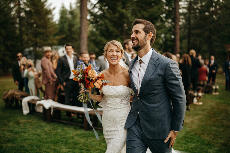 couple walking down aisle after ceremony