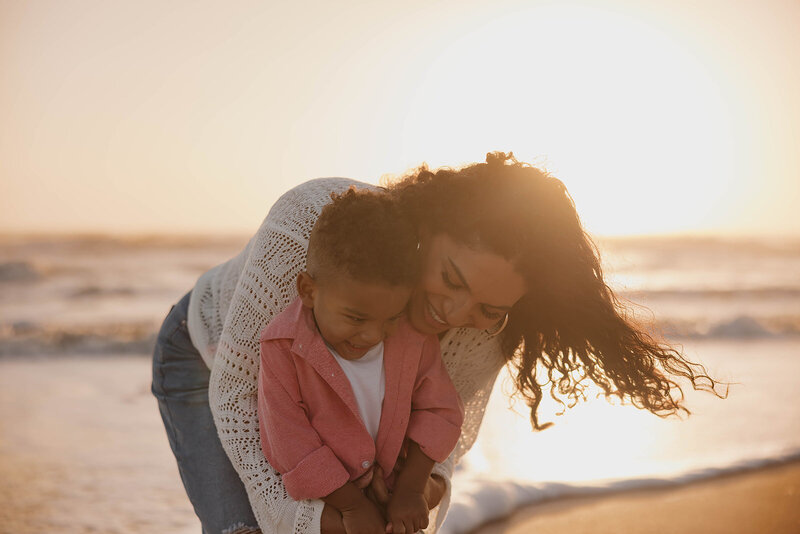 gainesville fl photographer dani of indie west photo on beach with camera