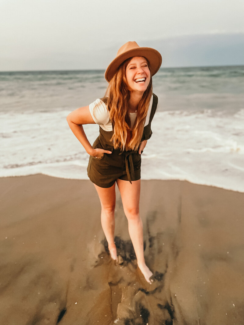 Ashley Mondor smiling on the beach
