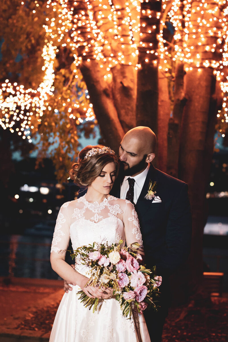 Groom embraced Bride and kissed her head