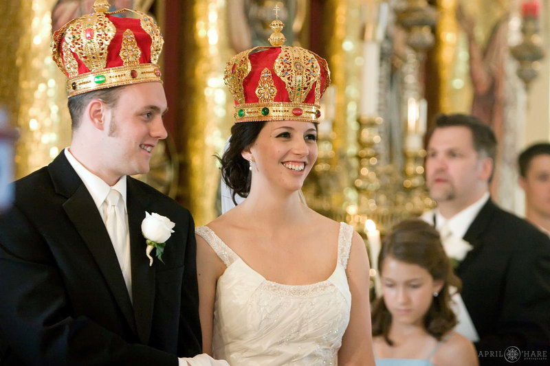 Wearing crowns at Assumption of the Theotokos Wedding in Denver